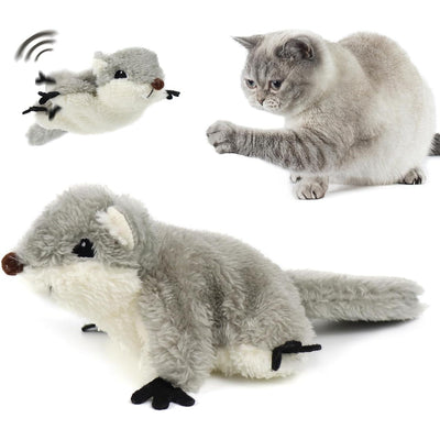 Plush toy resembling a rodent with remote control, next to a cat playing with it.